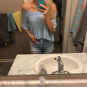 Off the shoulder blue blouse